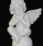 скульптура ангел на шаре